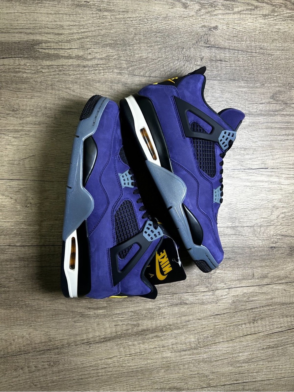 Nike Purple/Gray Air Jordan 4 Retro Basketball Sneakers.